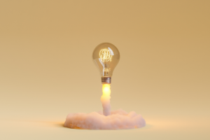 photo illustration of lightbulb appearing to launch like a rocket with smoke and bright light underneath it